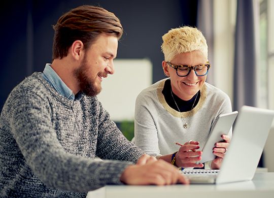 Man and Woman Evaluating E-ratejpg