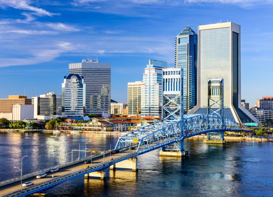 Jacksonville, Florida, USA downtown city skyline on St. Johns River.